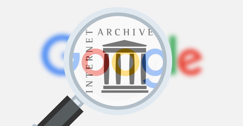 lente di ingrandimento su archivio internet con logo google sfocato sullo sfondo